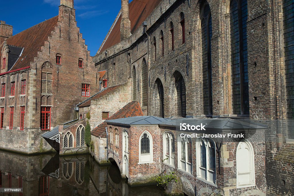 Historical houses along the canal (Bruges) Historic houses lining the peaceful canal. Bruges (Belgium) Architecture Stock Photo