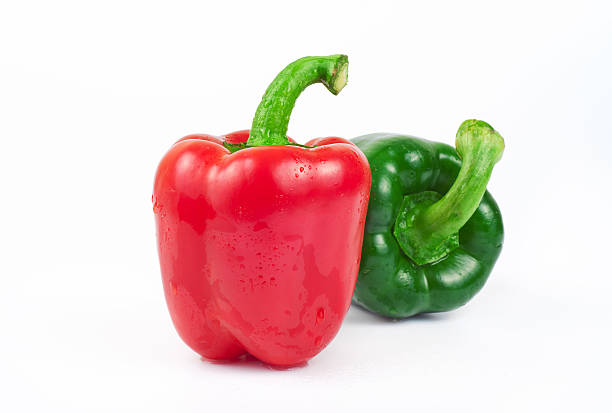 istock two wet sweet red and green peppers 517745666