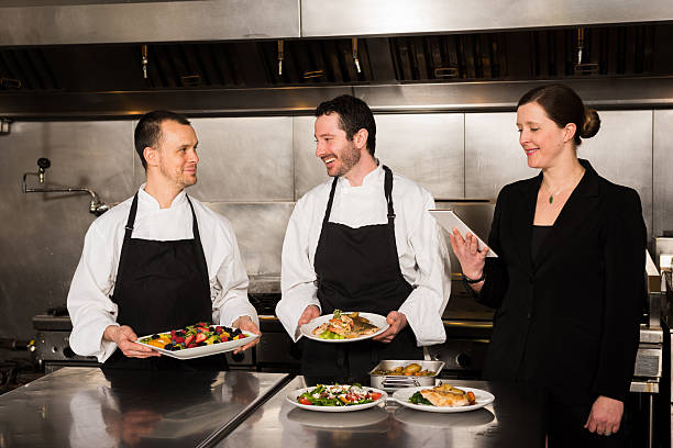 istock Professional culinary team in the kicthen 517745984