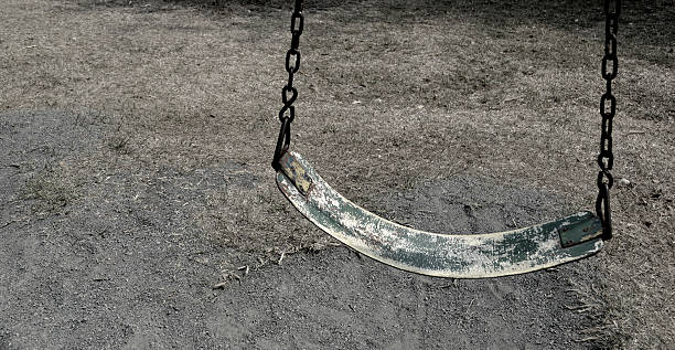 istock Old swing in park recreation, vintage, nature 517746252