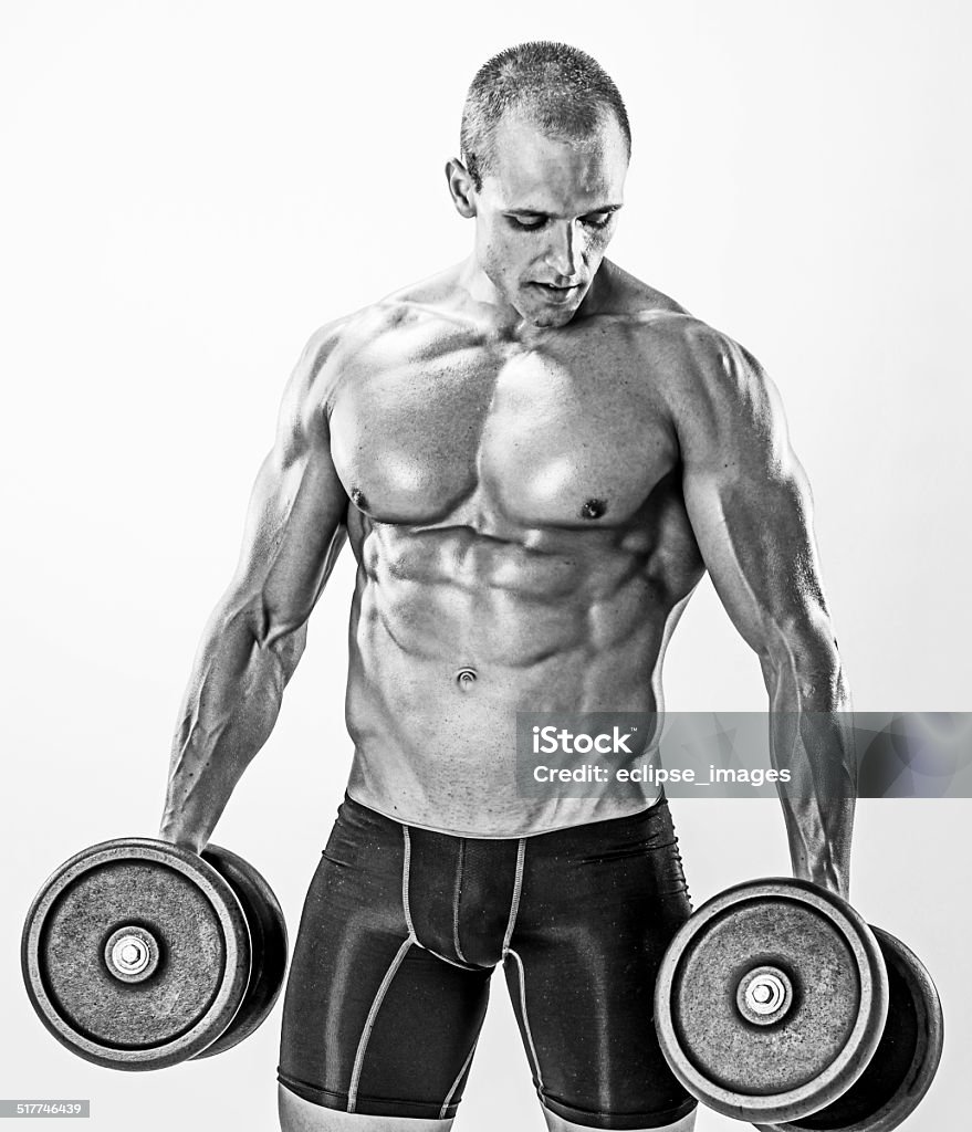 Bodybuilder exercising Abdominal Muscle Stock Photo