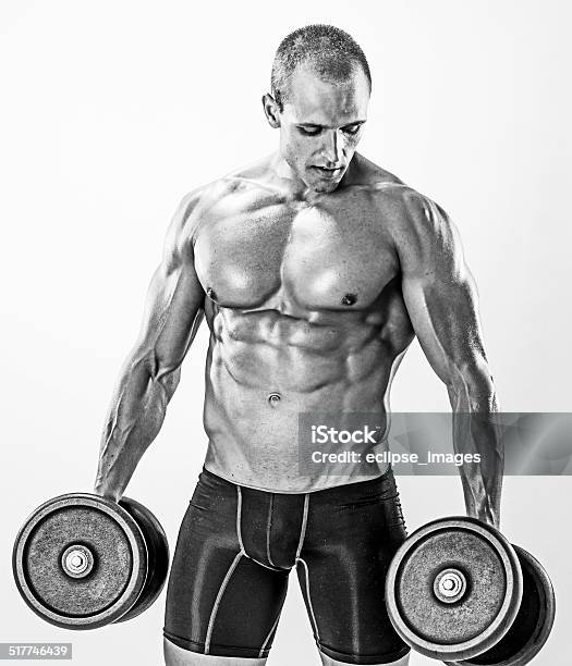 Bodybuilder Exercising Stock Photo - Download Image Now - Abdominal Muscle, Activity, Adult