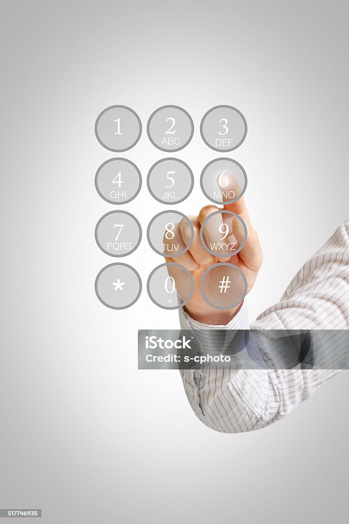 Men’s hand entering password on the touch screen Adult Stock Photo