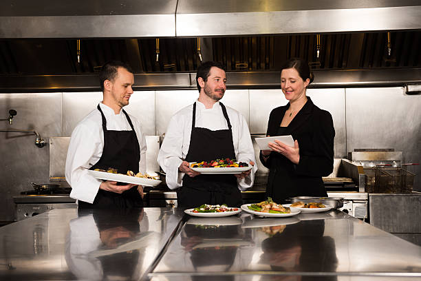 istock Professional culinary team in the kicthen 517747424
