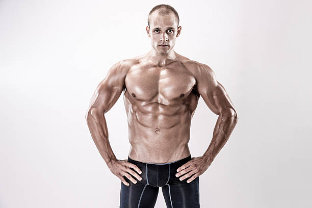 Handsome Athletic Man Flexing Muscles