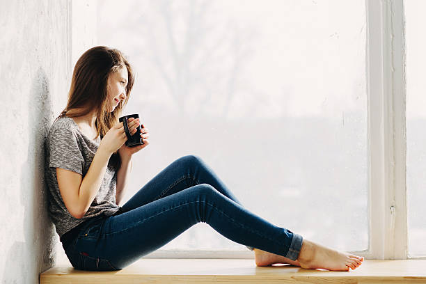 istock Beautiful girl is dreaming 517748520