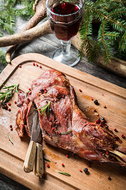 istock Roasted piece of venison and served with wine 517748797