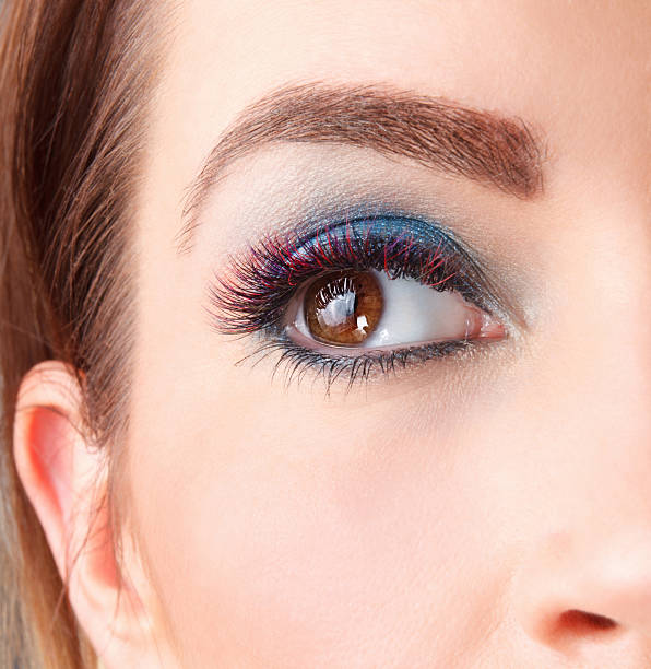 Close-up of colored eyelash extensions stock photo