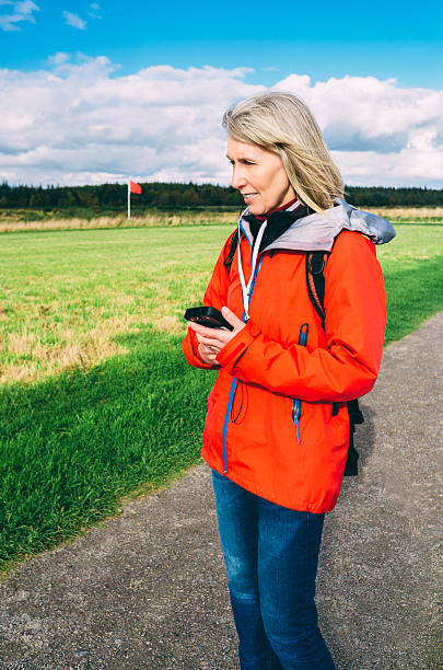 istock Woman on audio battlefield tour 517751179