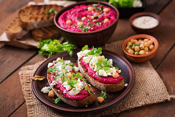 istock Vegan sandwiches with beetroot hummus, cucumber and blue cheese 517751668