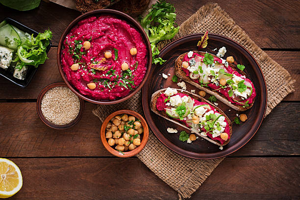 istock Vegan sandwiches with beetroot hummus, cucumber and blue cheese. 517751950