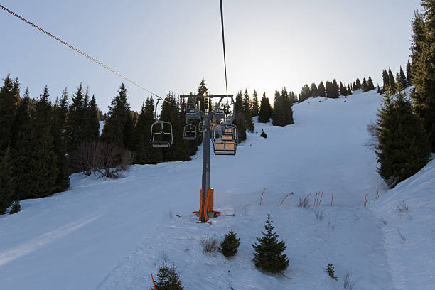 istock chair lift in the mountains 517752020