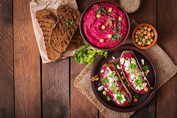 istock Vegan sandwiches with beetroot hummus, cucumber and blue cheese. 517752050