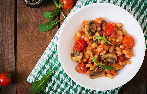 istock Stewed white beans with mushrooms and tomatoes 517752610