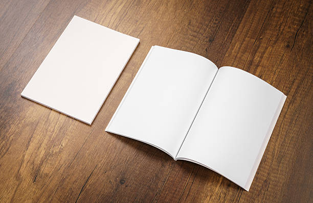 istock Blank catalog, magazines,book mock up on wood background 517752676