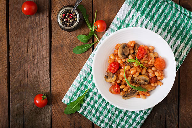 istock Stewed white beans with mushrooms and tomatoes 517752678