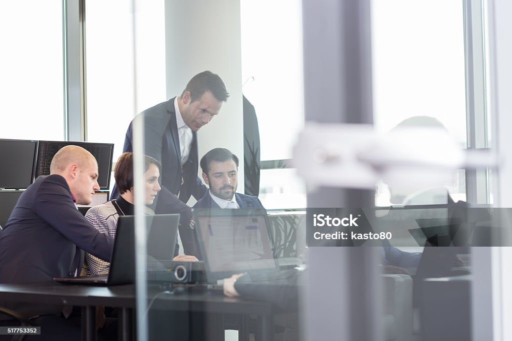 Business team working in corporate office. Business team working in corporate office. Working meeting with business people brainstorming. Business and entrepreneurship concept. Adult Stock Photo