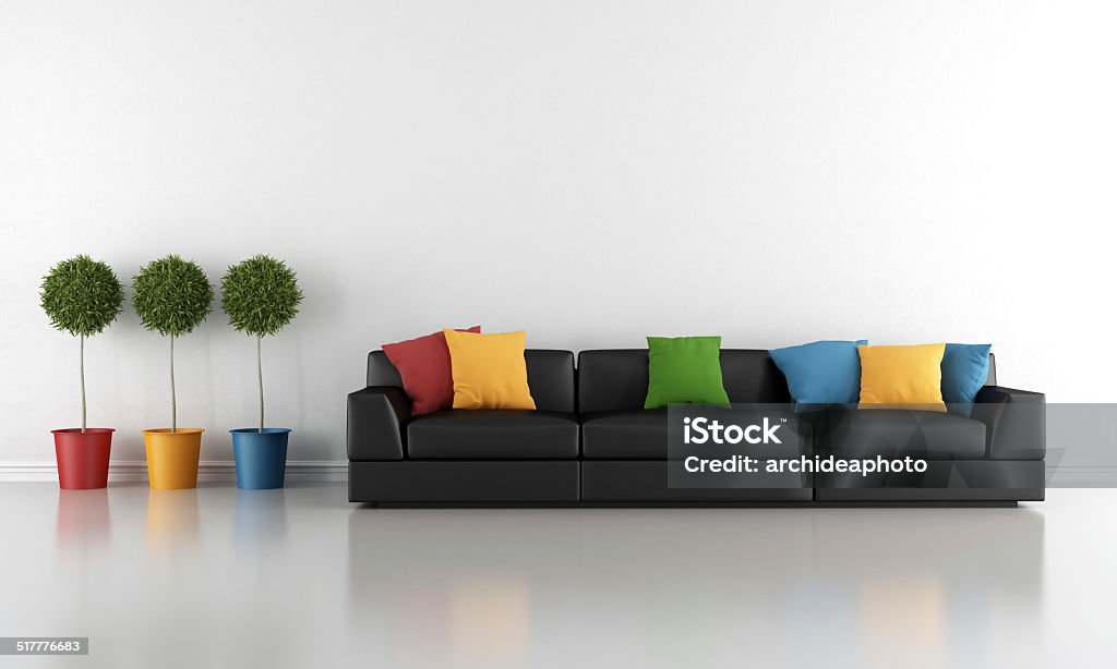 Living room Contemporary living room with black sofa and colorful cushion Apartment Stock Photo