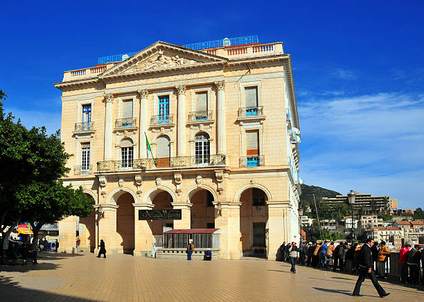Béjaïa, Algeria - January 26, 2008: people enjoy the view near the Bank of Algeria building - 1er Novembre square