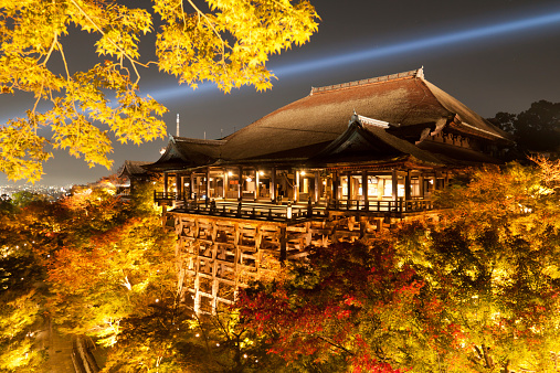 Kyoto, Japan – November 12, 2012: It is a photograph of the Illuminated of the autumn leaves of Kiyomizu-dera Temple in Kyoto, Japan. It is a beautiful sight of Illuminated of autumnal leaves and stage of Kiyomizu-dera Temple.