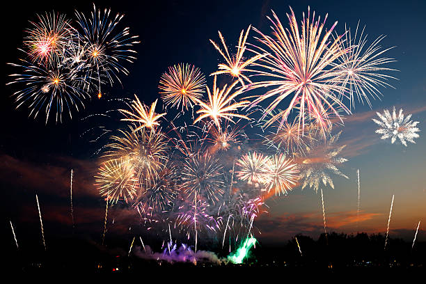 istock Colorful fireworks of various colors over evening sky 517777781