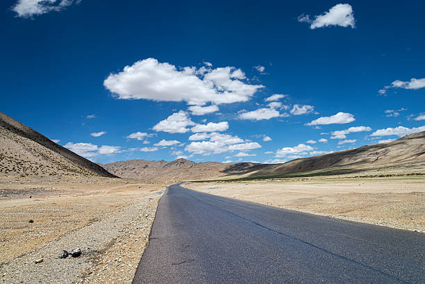 istock Highway among high altitude flat plateau 517777905