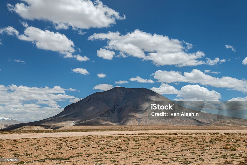 Lonely mount shadowed by clouds Asia Stock Photo