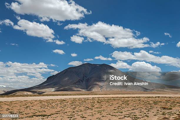 Lonely Mount Shadowed By Clouds Stock Photo - Download Image Now - Asia, Beauty In Nature, Blue