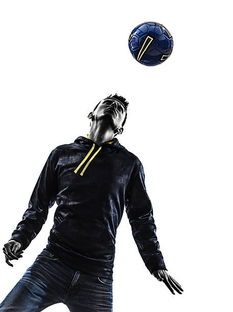 istock young man soccer freestyler player silhouette 517778525