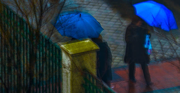 istock Umbrellas in a rainny day 517778693