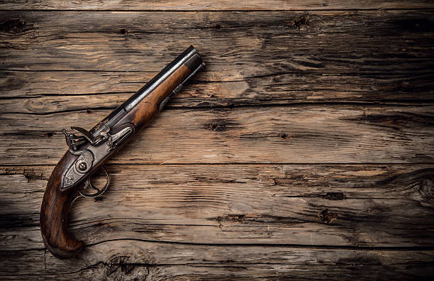 old pistola de mano en wod - armed forces human hand rifle bullet fotografías e imágenes de stock