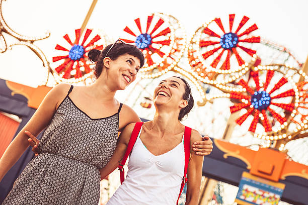 istock Two friends at amusement park 517780535