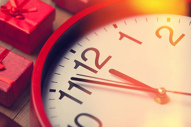 istock Vintage clock on christmas background 517780597