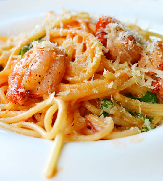 istock Delicious pasta spaghetti with shrimps and other seafood 517780871