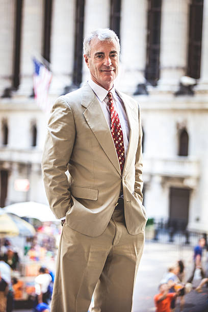 istock Senior businessman on the street 517781221