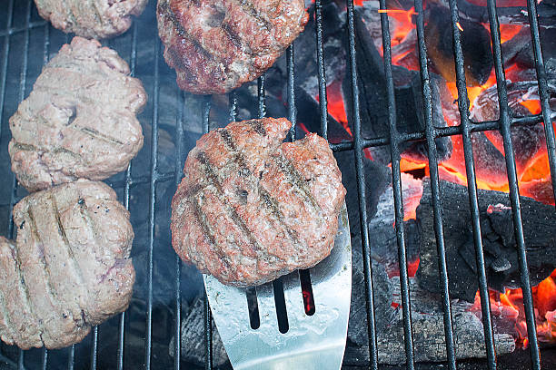 istock Burgers on the grill 517782119