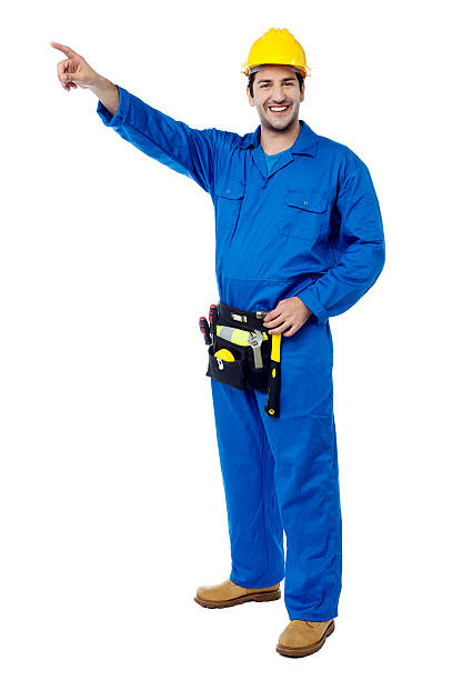 istock Happy male worker pointing at something 517782579