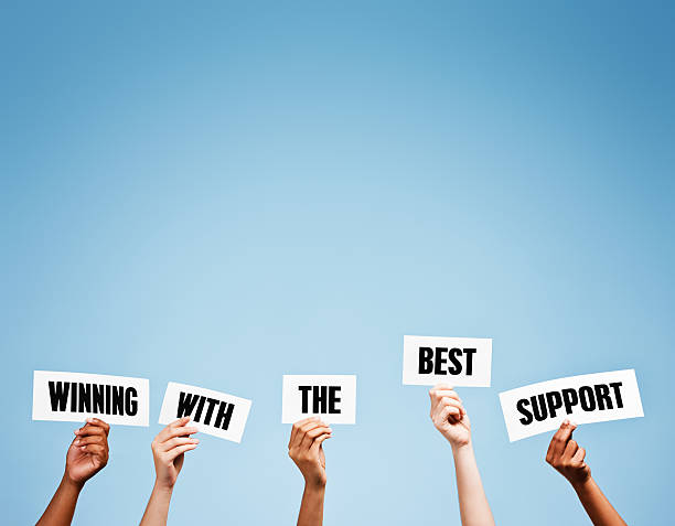 istock Hand-held signs promise