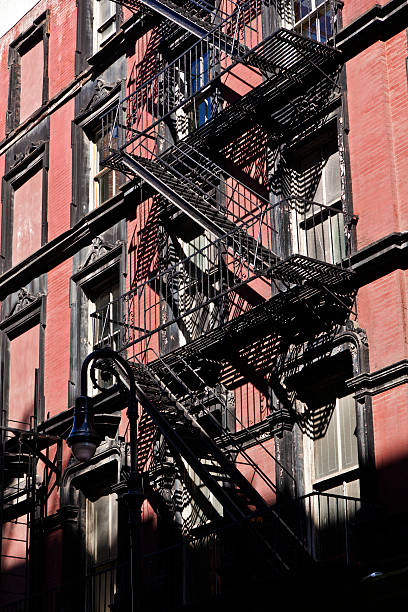 istock fire escape at an old downtow house 517797259