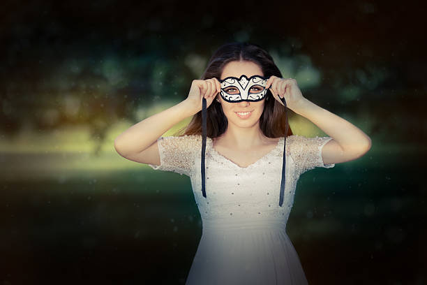 istock Young Woman Putting on a Mask 517798015