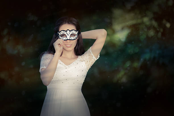 istock Young Woman Putting on a Mask 517798031