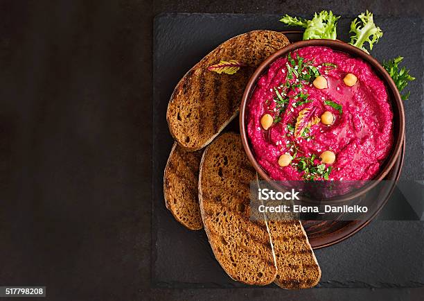 Roasted Beet Hummus With Toast In A Ceramic Bowl Stock Photo - Download Image Now - Hummus - Food, Beet, Common Beet