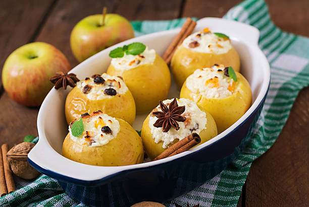 istock Appetizing baked apples with cottage cheese and raisins 517798666