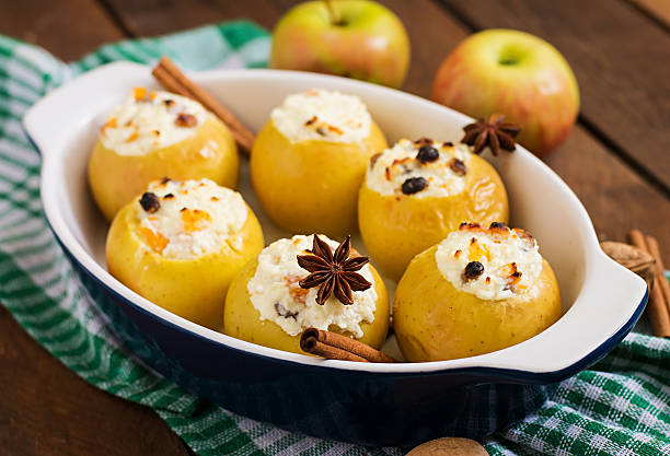 istock Appetizing baked apples with cottage cheese and raisins 517798726