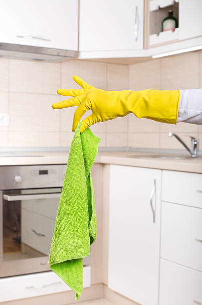 istock Hand with dirty cloth in the kitchen 517798780