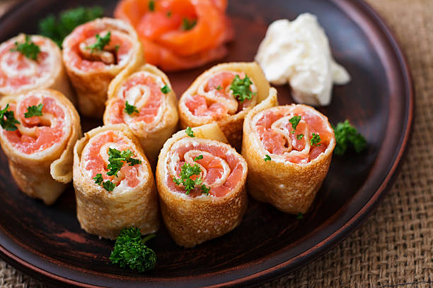 istock Appetizing pancakes with salmon and cream cheese 