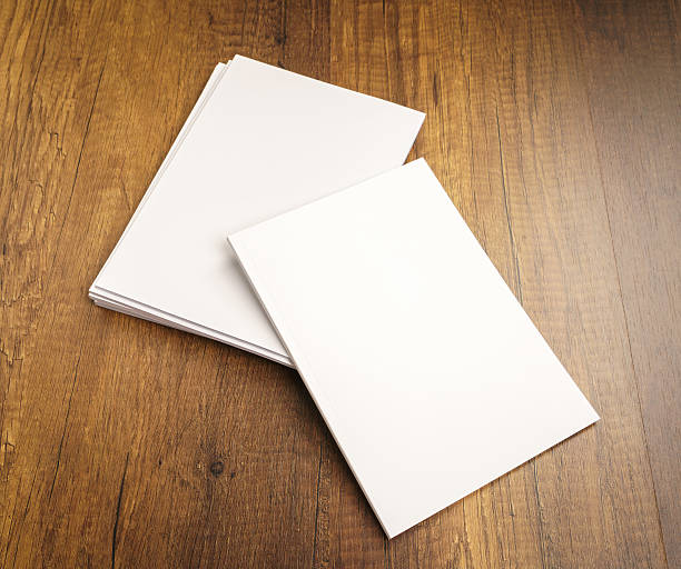 istock Blank catalog, magazines,book mock up on wood background 517799350