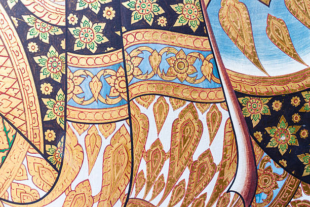 istock Traditional Thai art on temple wall 517799778