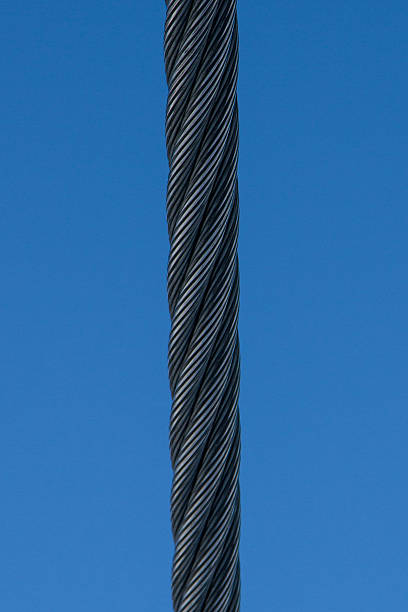 istock steel cable on a background of blue sky 517802200