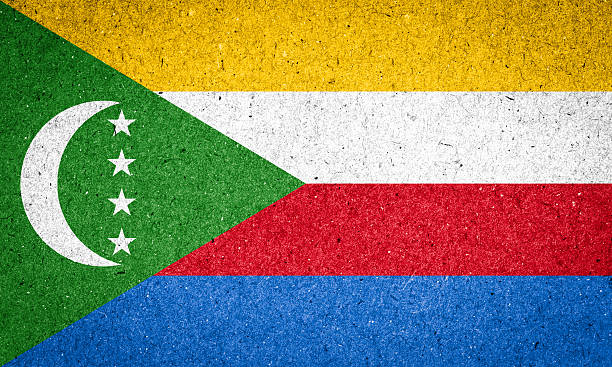 istock Comoros flag on paper background 517802607